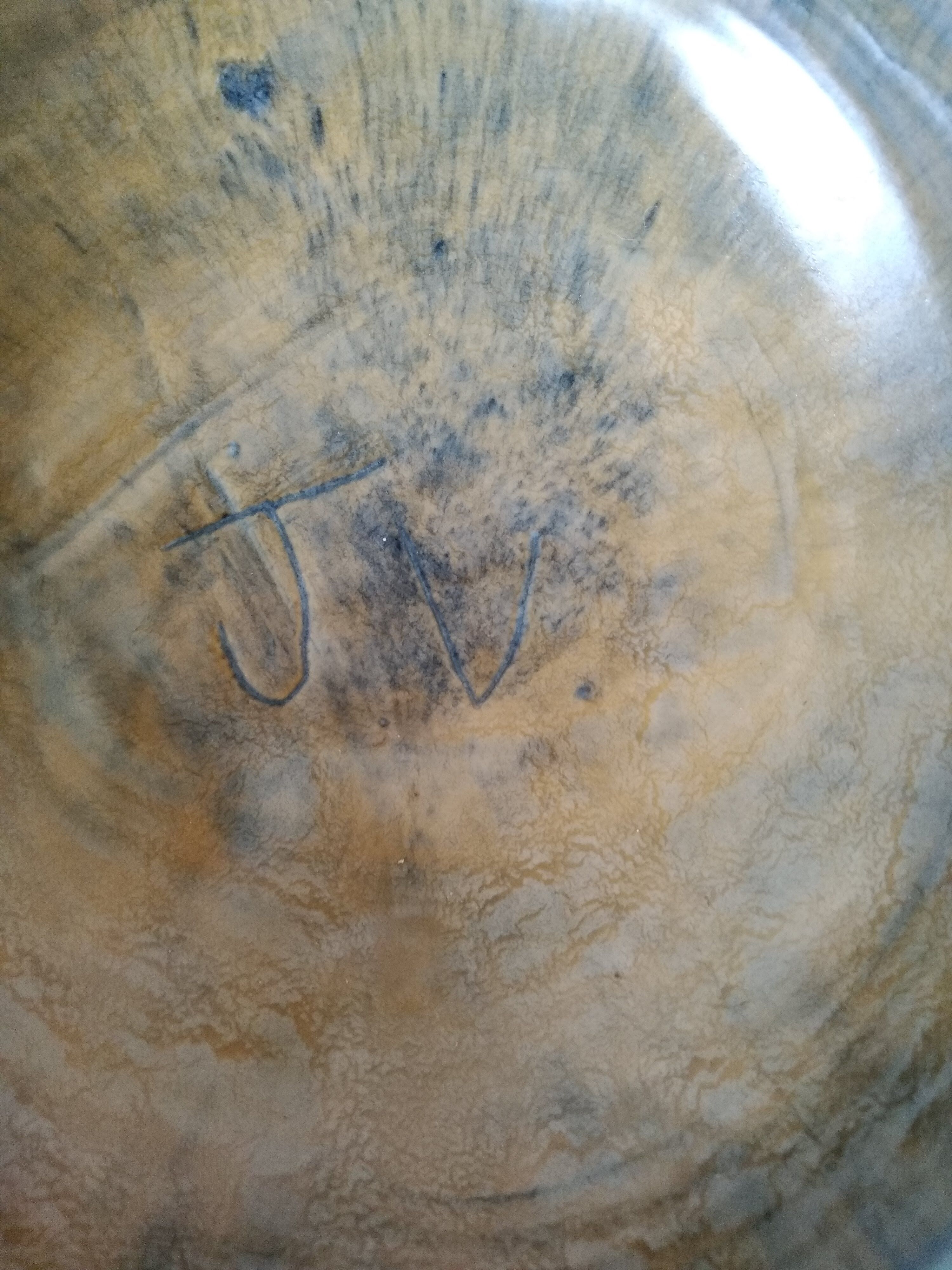 Vintage ceramic sun signed