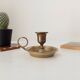 Vintage brass candle holder in gold.