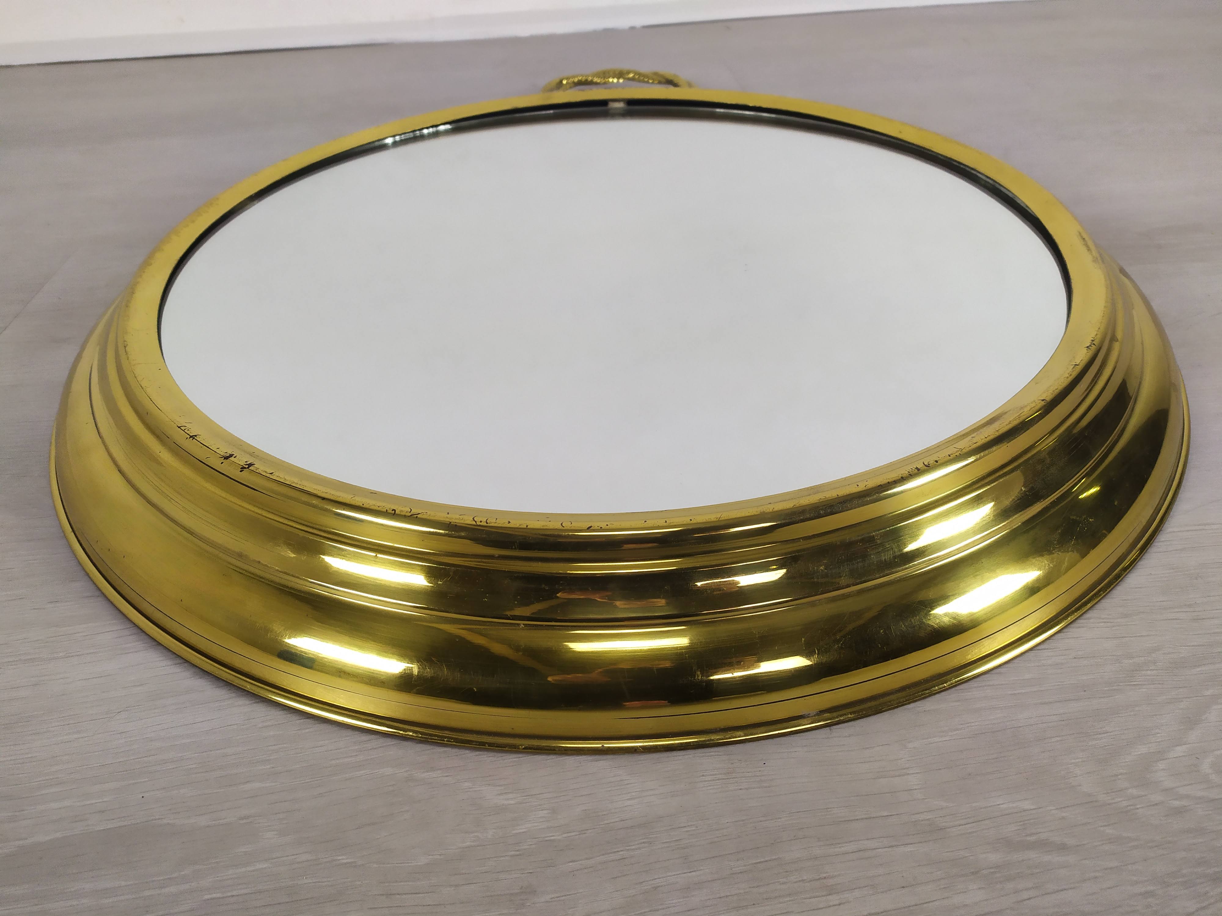 Golden brass mirror
