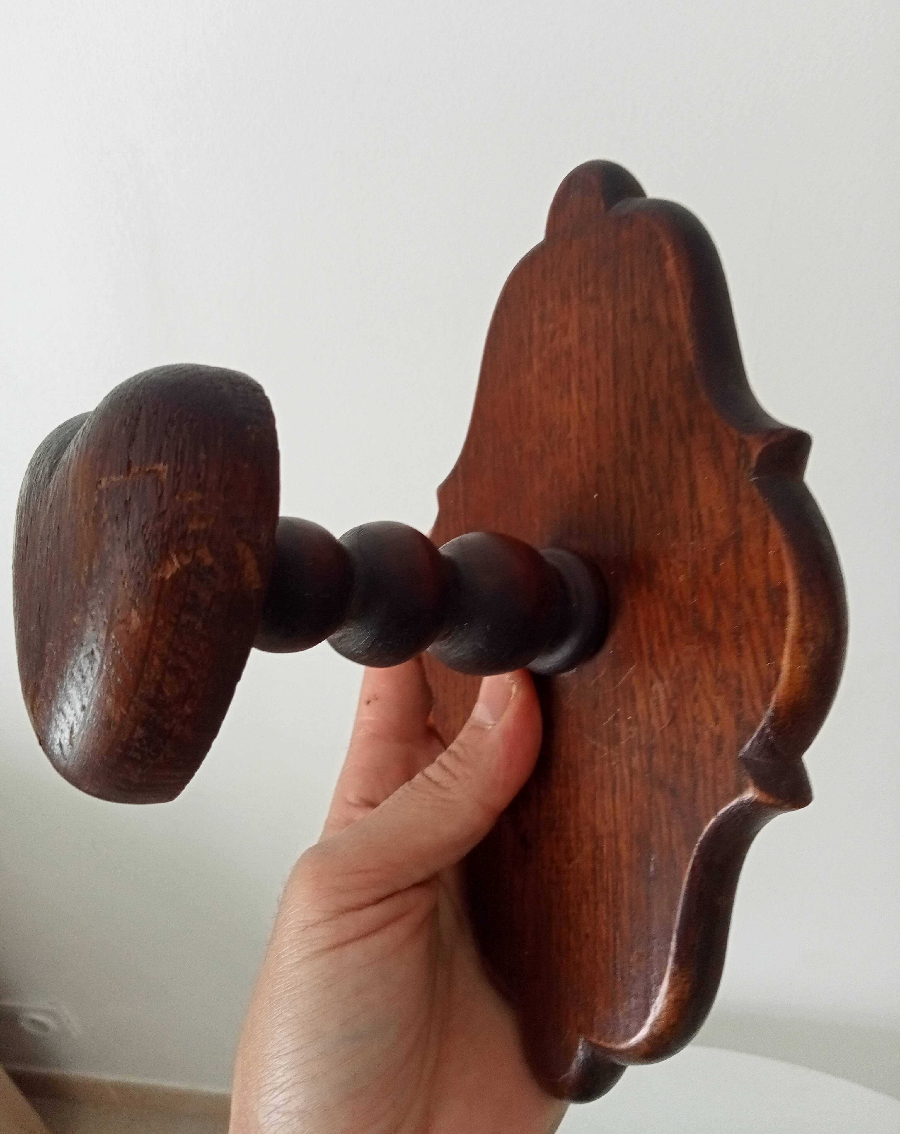 Vintage wall coat rack in carved solid wood, popular art.