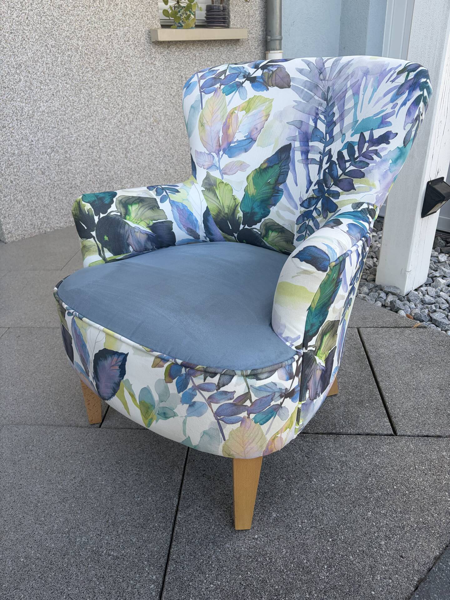 Contemporary ALC frog chair, reupholstered in watercolour floral fabric.