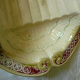 Old asparagus dish in saline slip fixed cradle