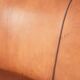 Sheepskin 2-seater sofa with a warm cognac brown colour scheme