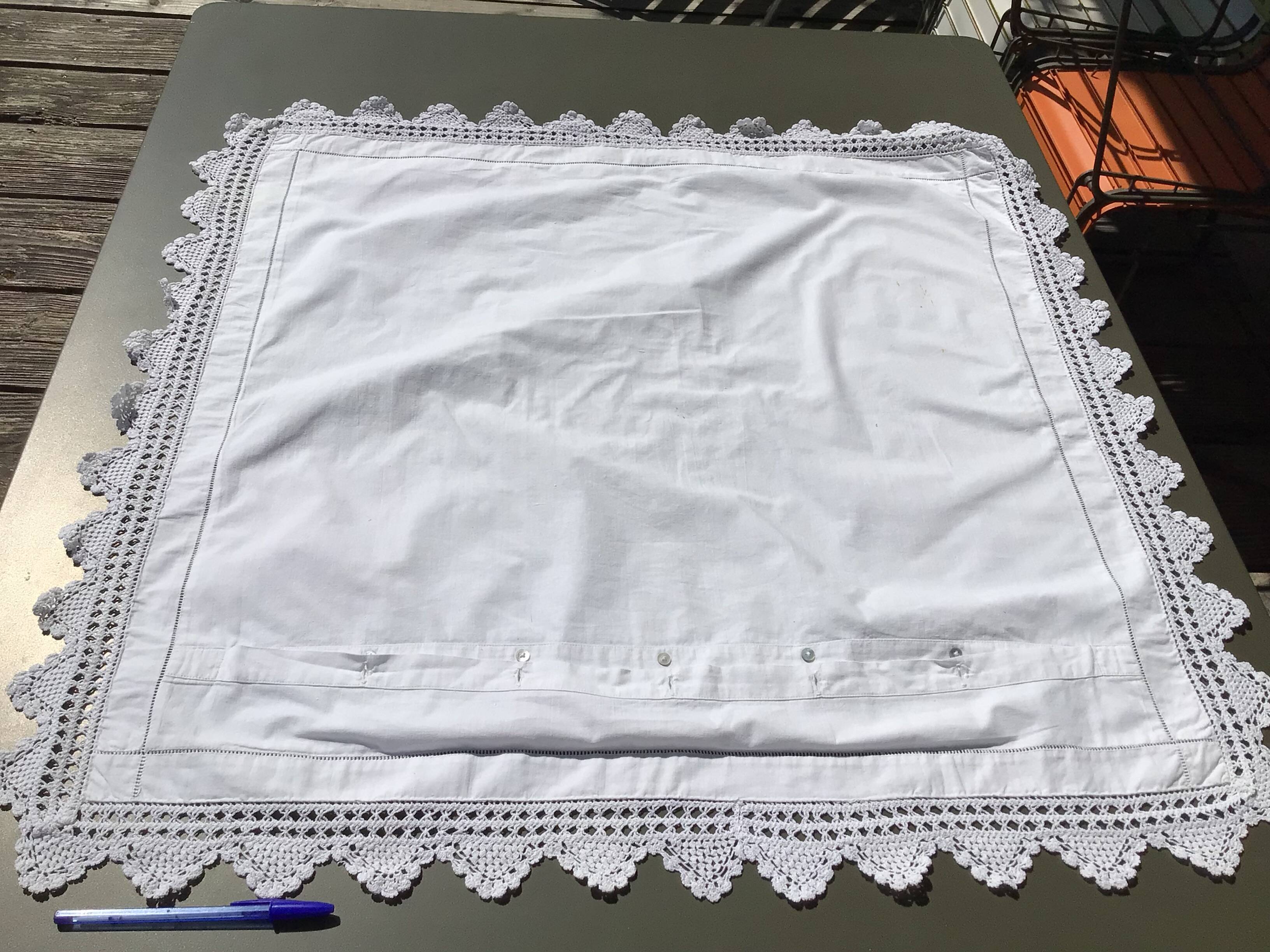 MC embroidered pillowcase with flower detailing and crocheted edge