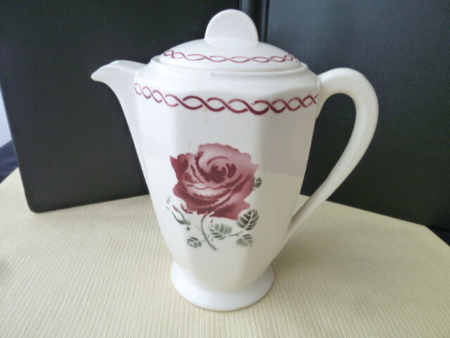 Old coffee maker, pourer in half porcelain of Badonviller