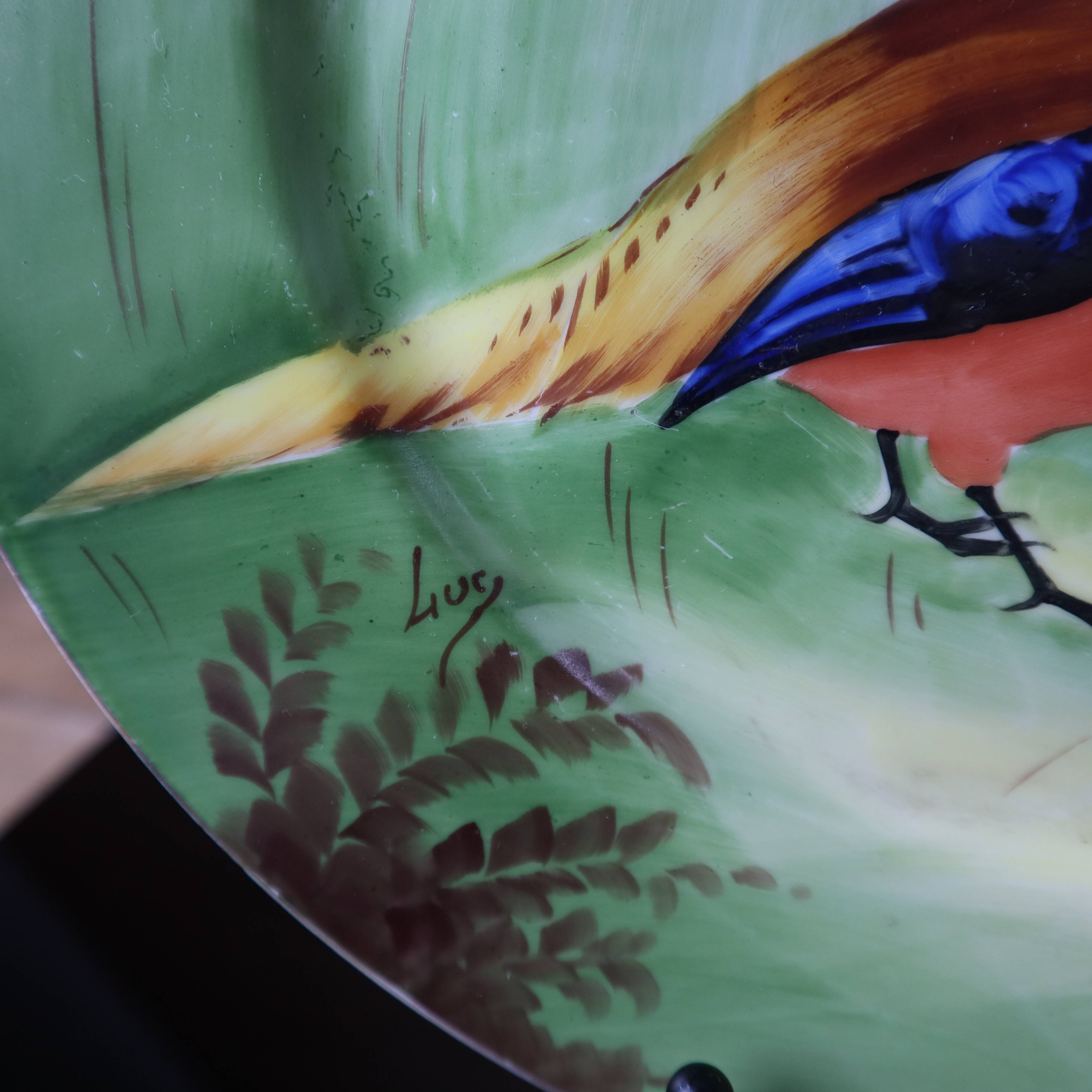 3 decorative porcelain plates from Limoges featuring partridges and pheasants.