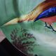 3 decorative porcelain plates from Limoges featuring partridges and pheasants.