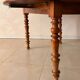 Round solid oak table with extensions, cabinetmaker's sliding mechanism,