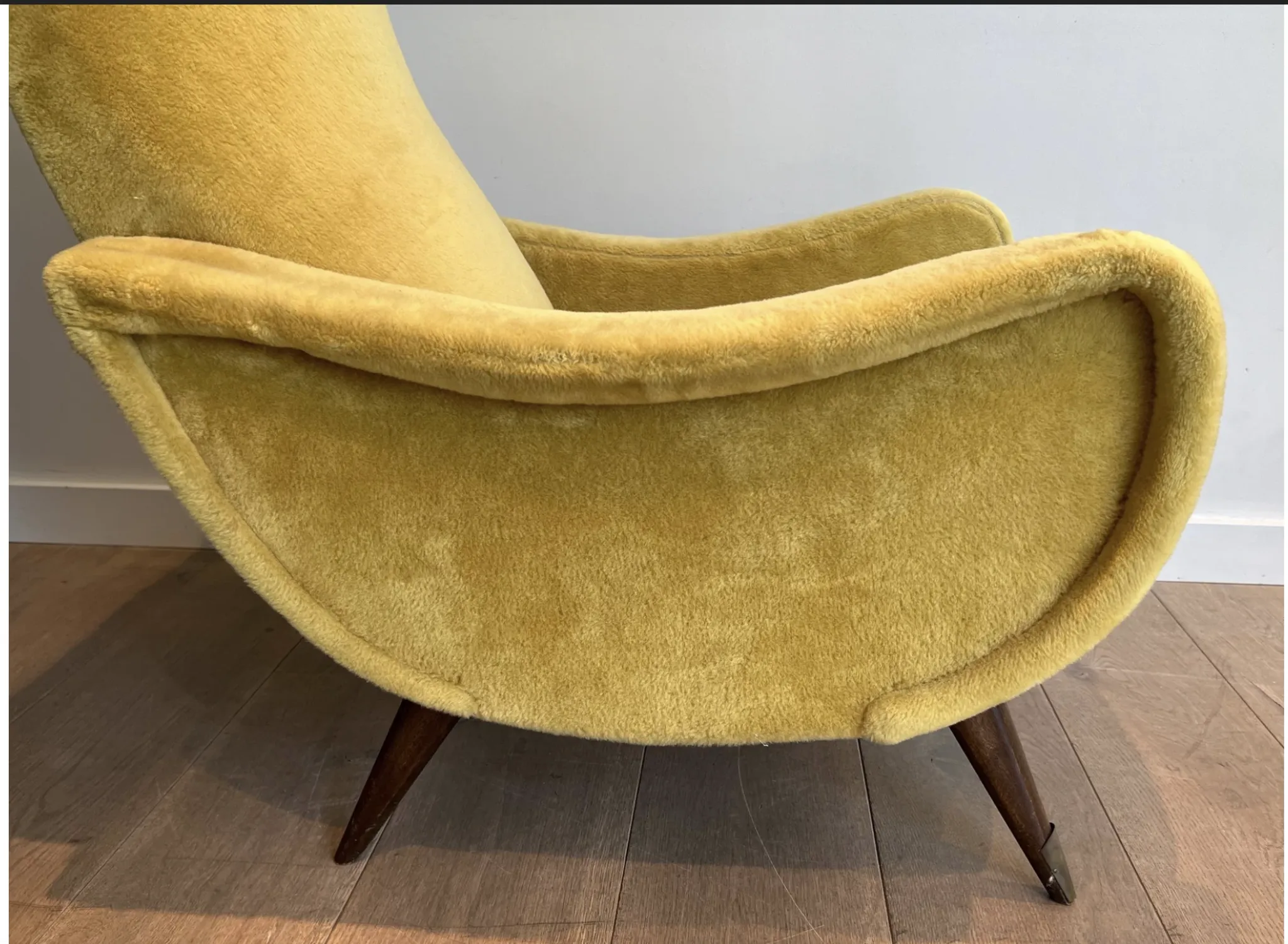Two designer velvet armchairs from the 1960s in yellow.