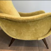 Two designer velvet armchairs from the 1960s in yellow.