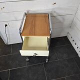 Mid-20th century metal cabinet table on wheels