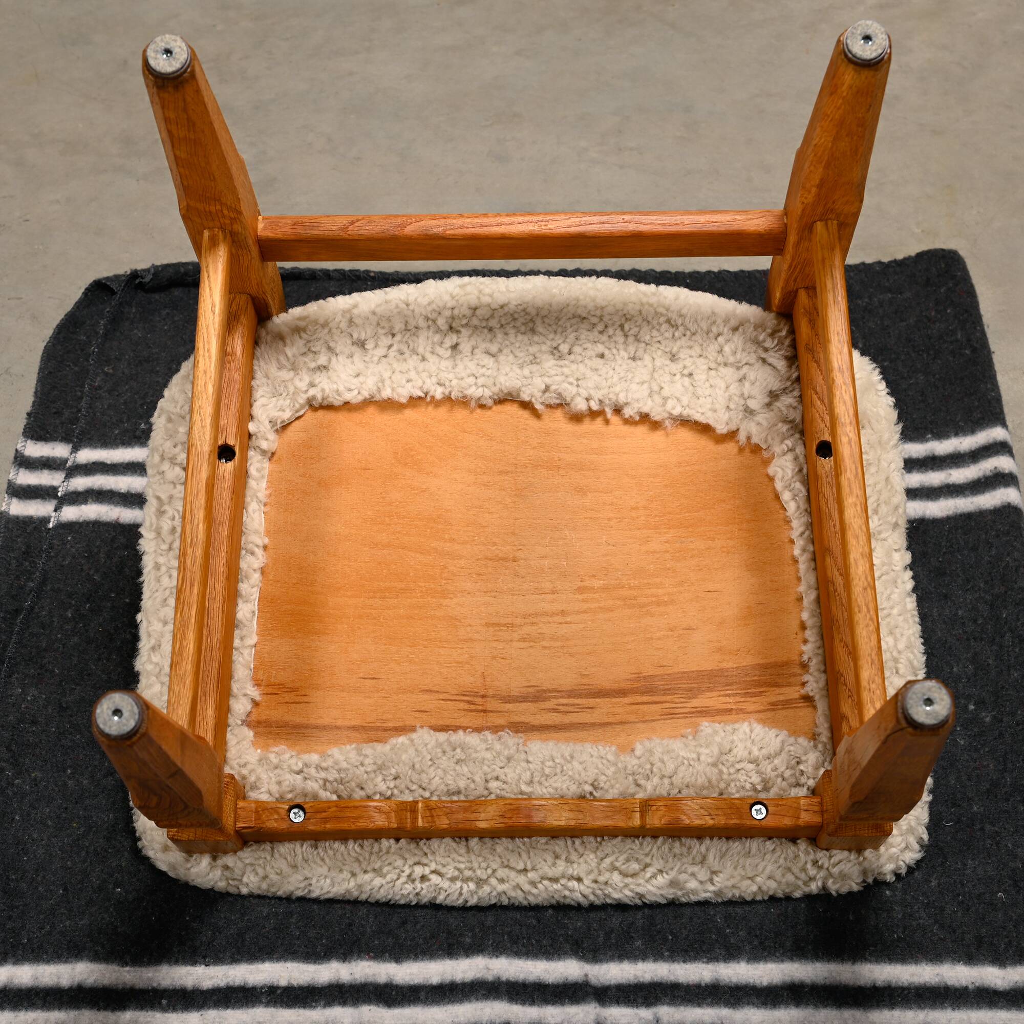 Henning Kjærnulf brutalist dining chairs set in Oak and Sheepskin, Denmark
