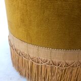 Velvet and fringed ottoman
