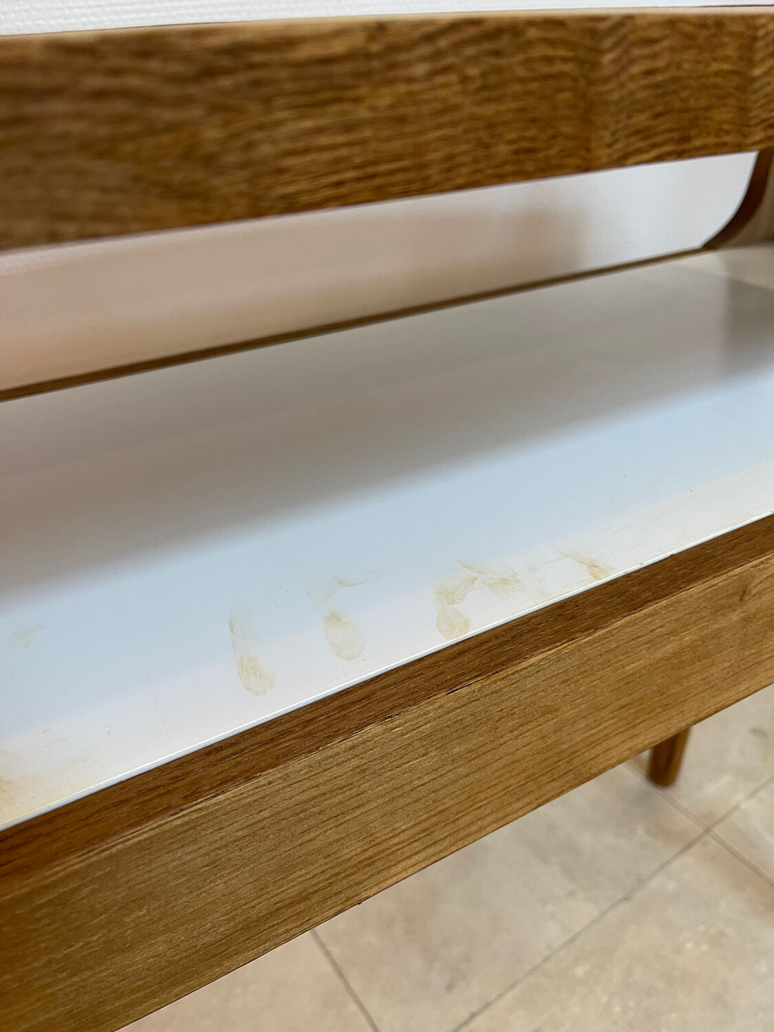 Small contemporary console in stained walnut wood.