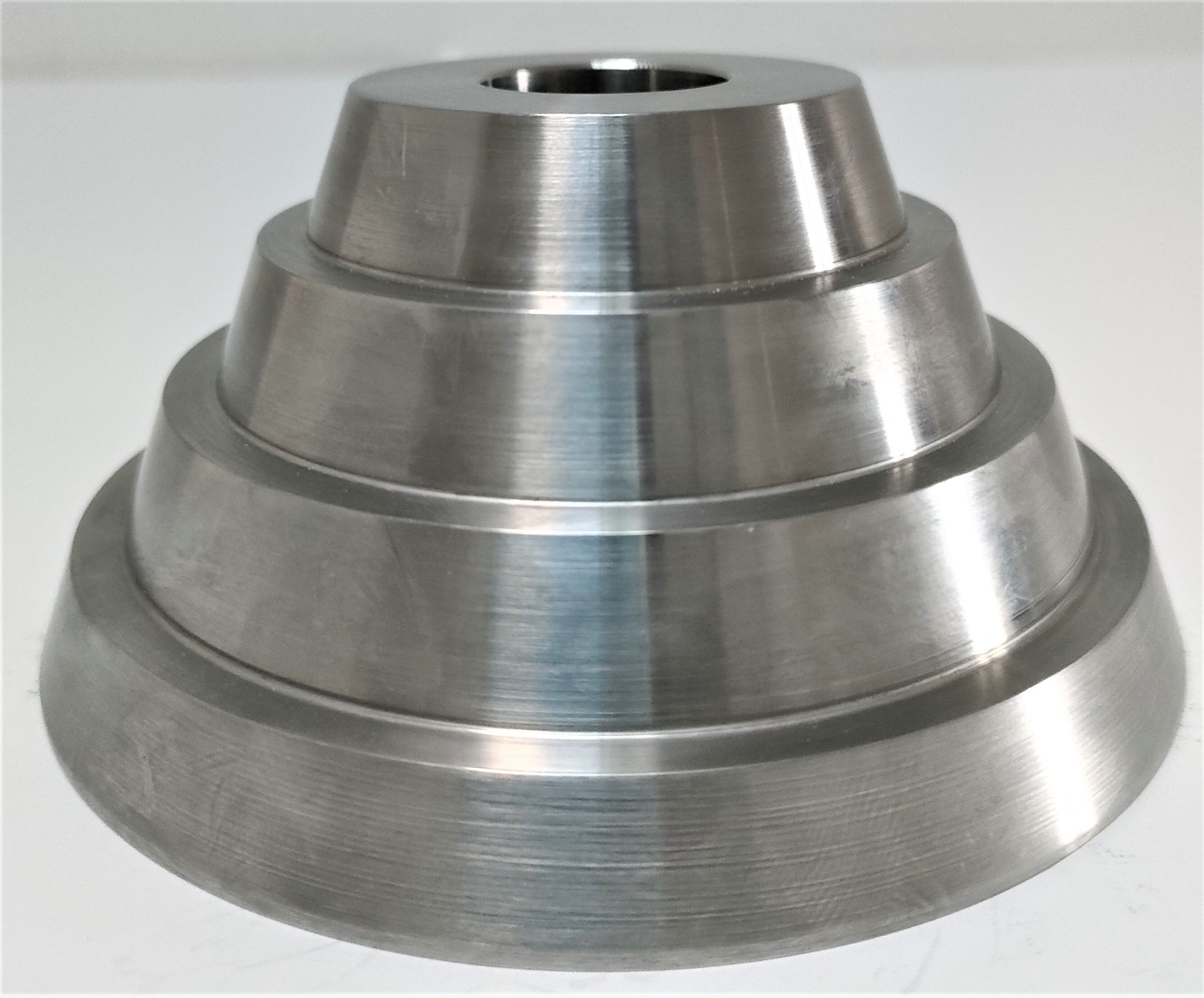Solid steel candle holder turned design