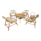 4 armchairs and a coffee table made of rattan and bamboo wood, vintage.