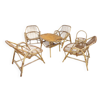 4 armchairs and a coffee table made of rattan and bamboo wood, vintage.