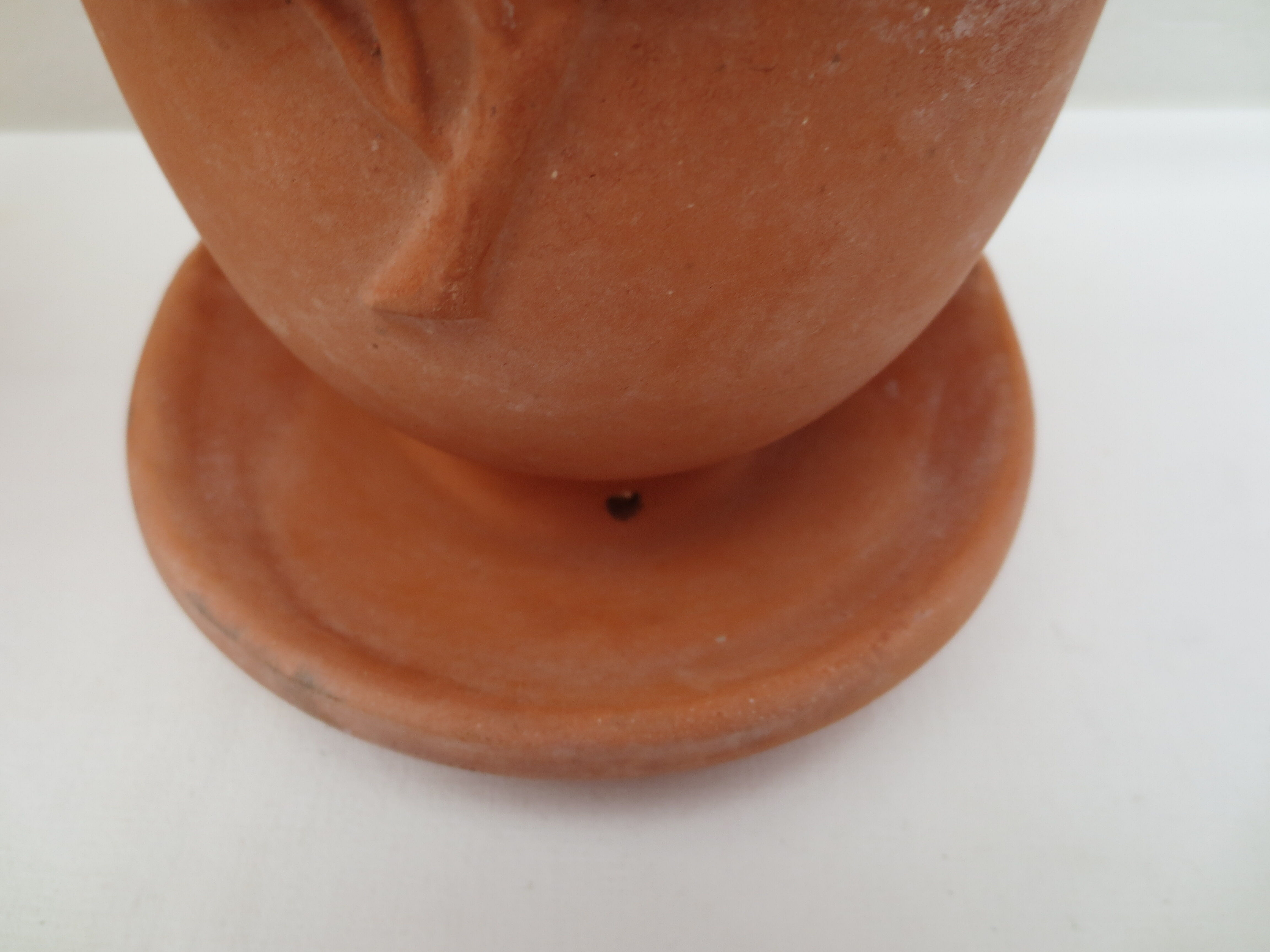 Duo of decorated terracotta wall flowerpots