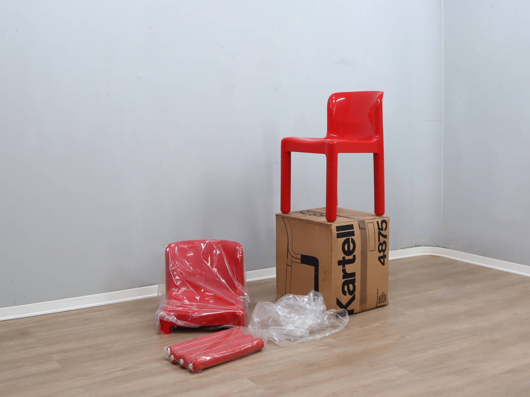 1970s pair of Kartell Model 4875 Chairs by Carlo Bartoli (fund STOCK)