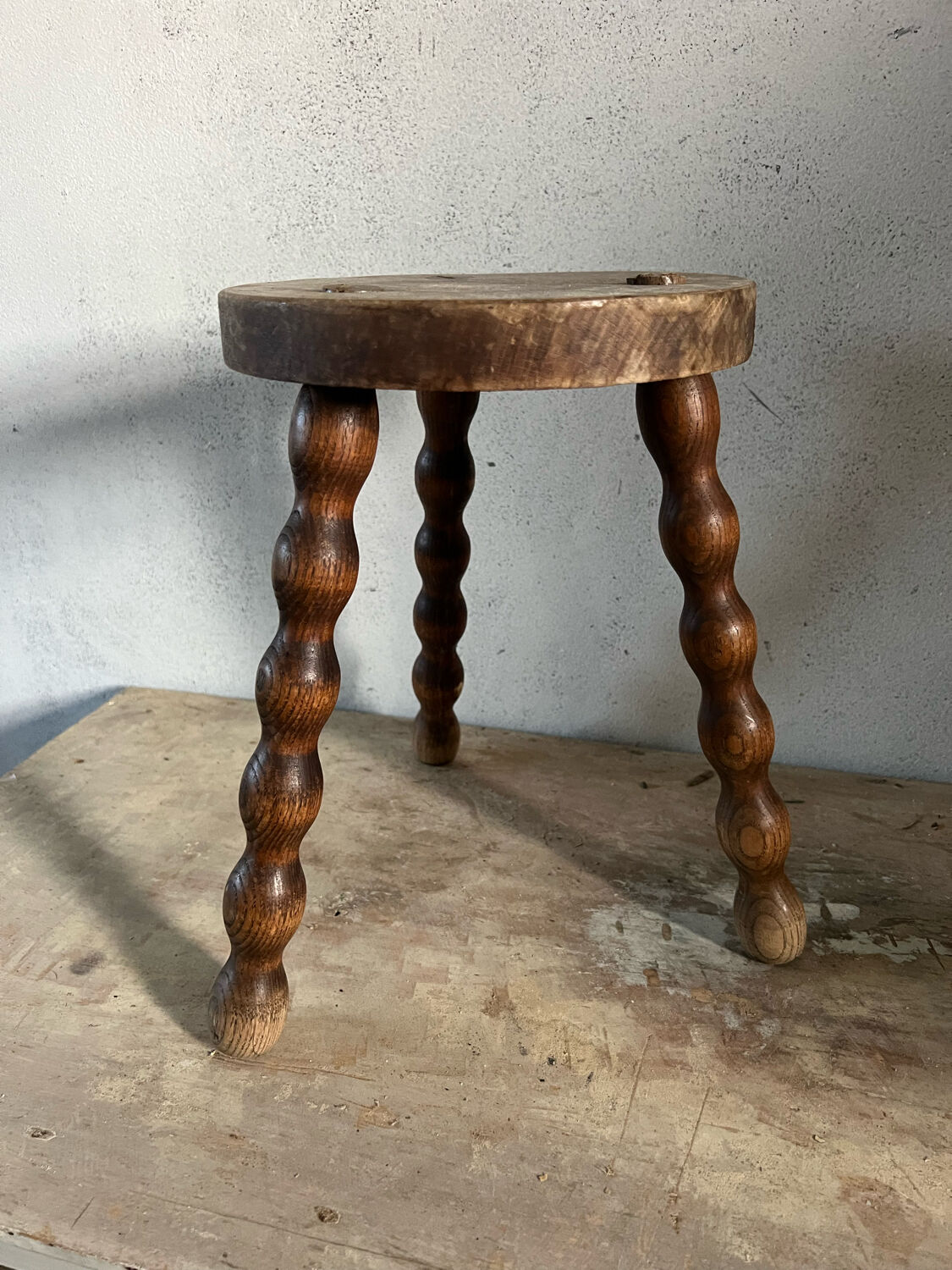 Wooden tripod stool