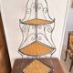 Etagère d'angle en osier et fer forgé