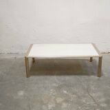 Vintage coffee table in travertine and brass