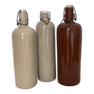 Set of old glazed stoneware bottles.