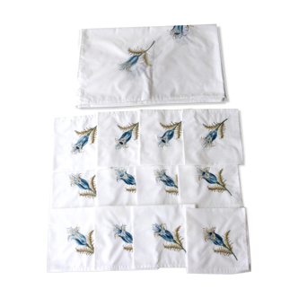 Antique rectangular hand-embroidered tablecloth decorated with thistle and 12 towels