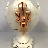 Planter of oblong shape on foot