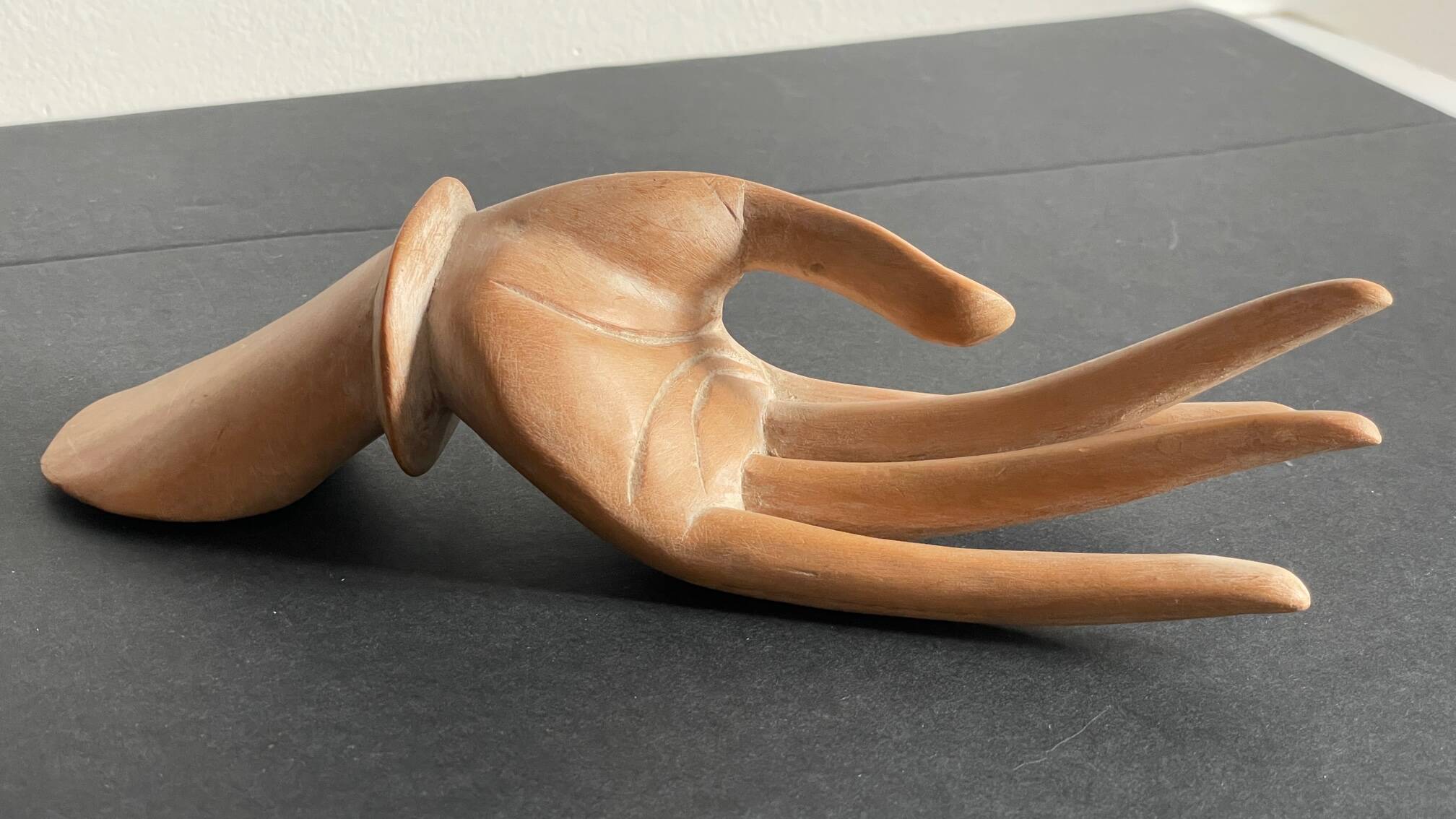 Wooden hand sculpture