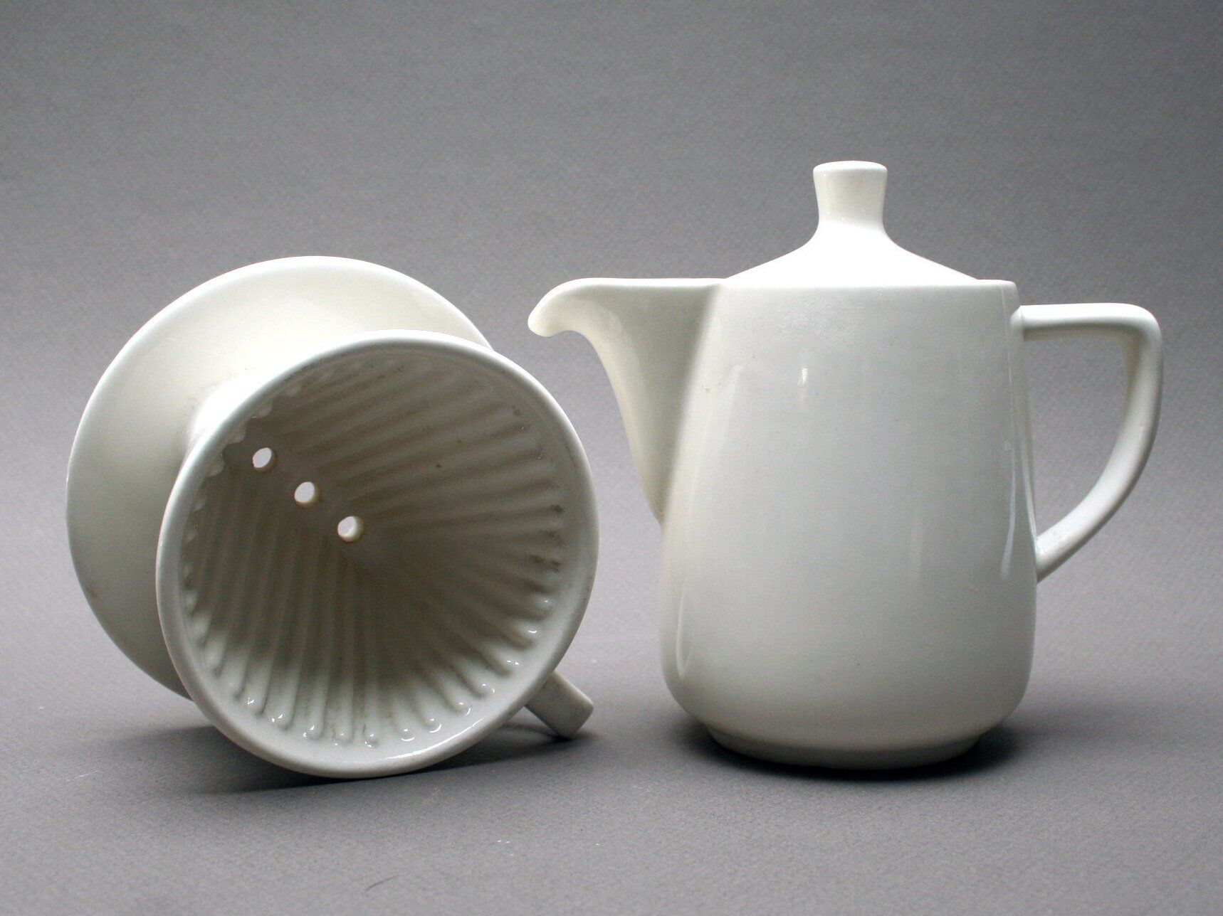 White ceramic coffeemaker and melitta filter, 60 years