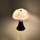 Black "Pipistrello" table lamp by Gae Aulenti for Martinelli.