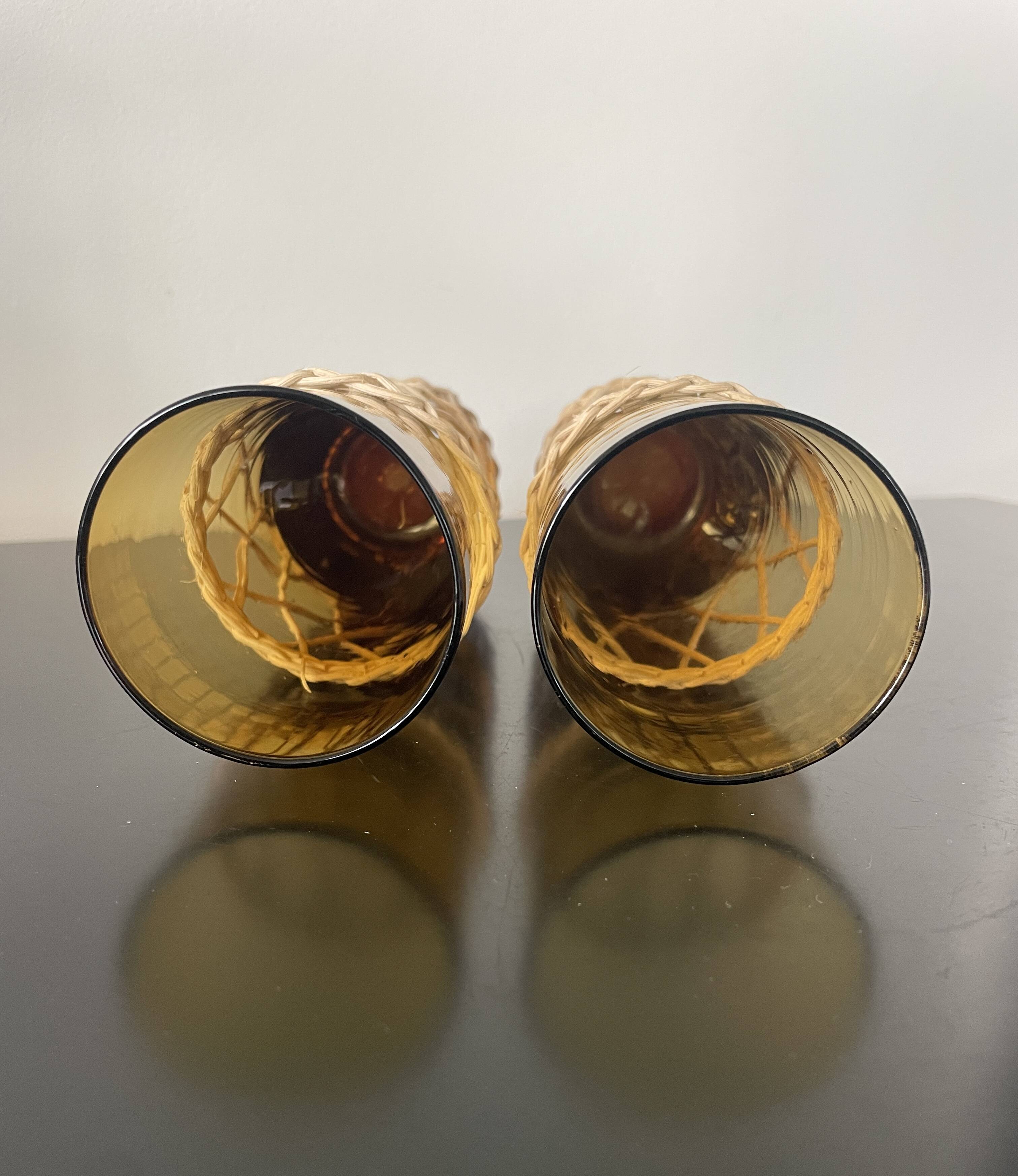 Set of 2 smoked orangeade glasses in woven wicker