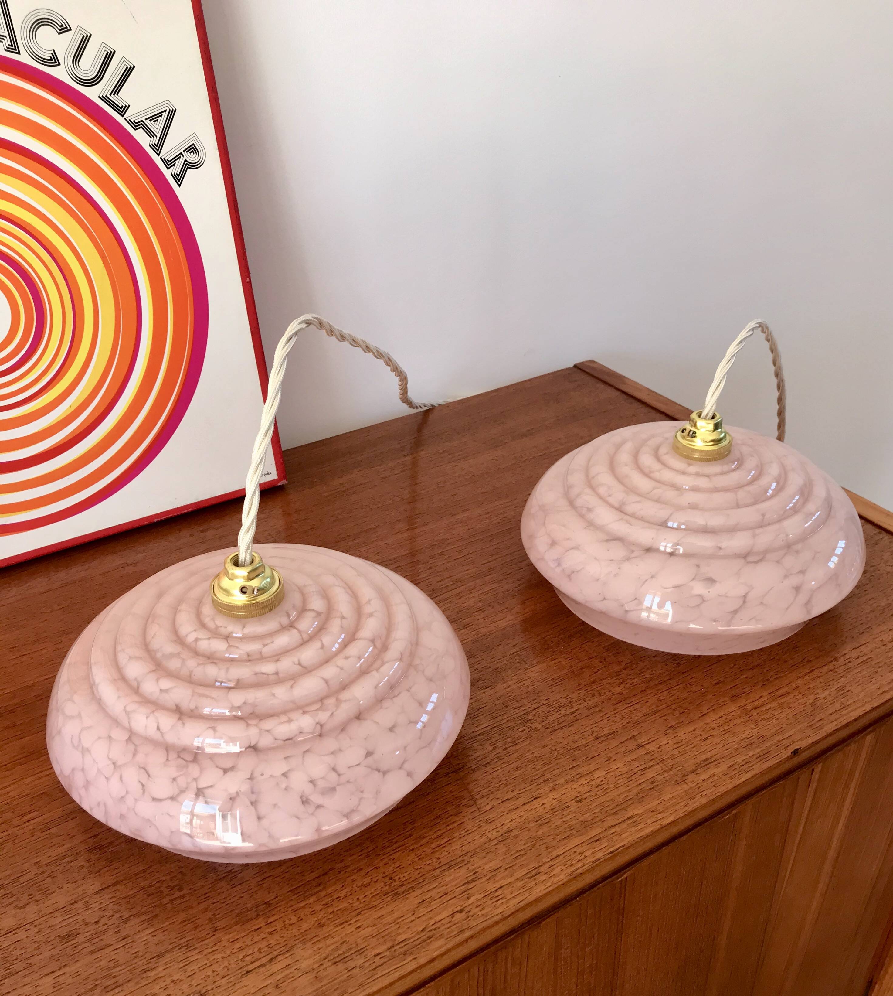 pair of candy pink Clichy glass pendant lights from the 1950s