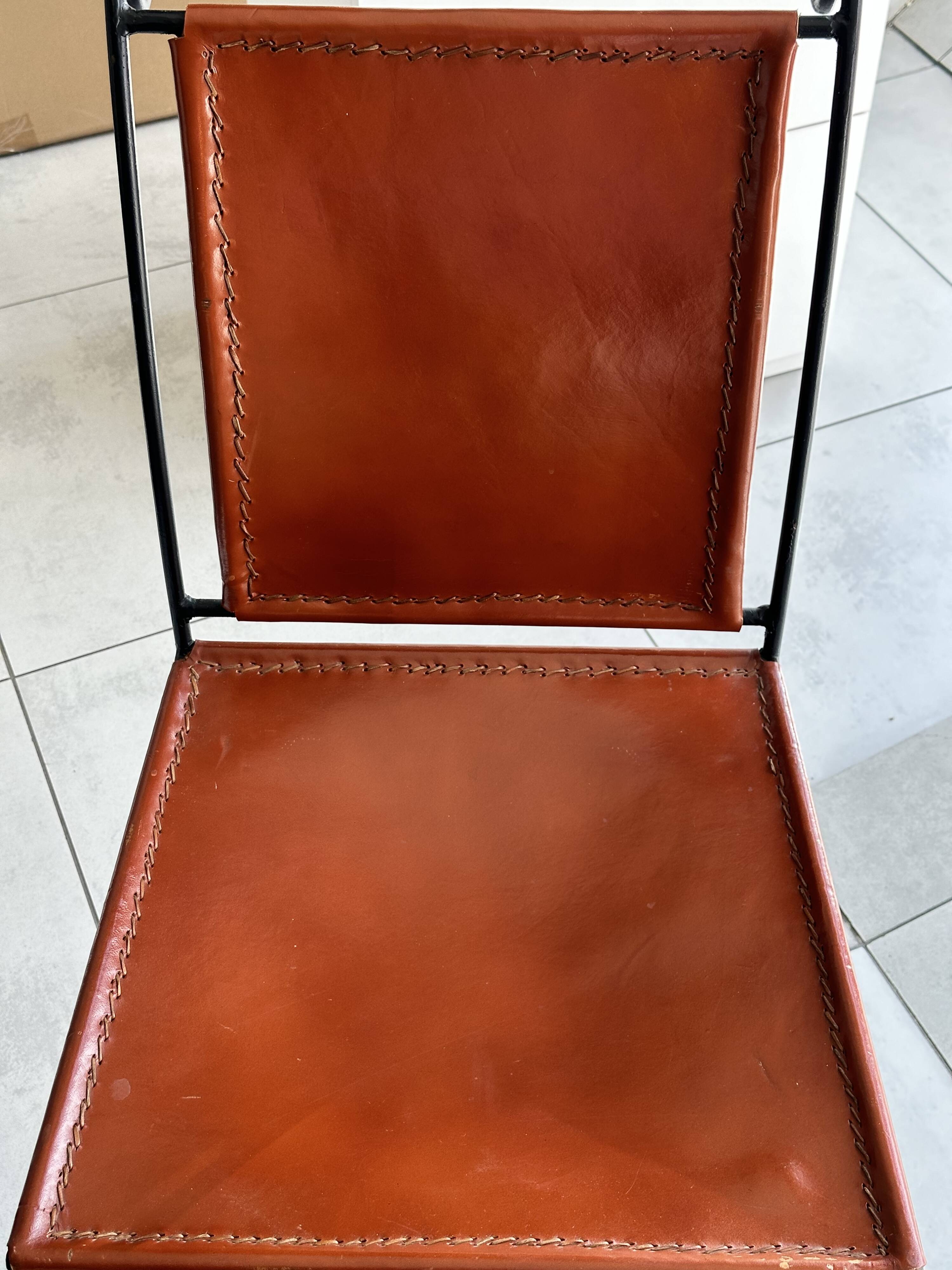 Chair in leather and wrought iron