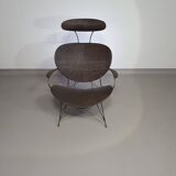 Armchair designed by Yuzuru Yamakawa  Metal frame.  Seat and back in braided rattan.