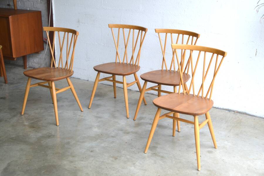 Series of four “candlestick” chairs by Lucian Ercolani