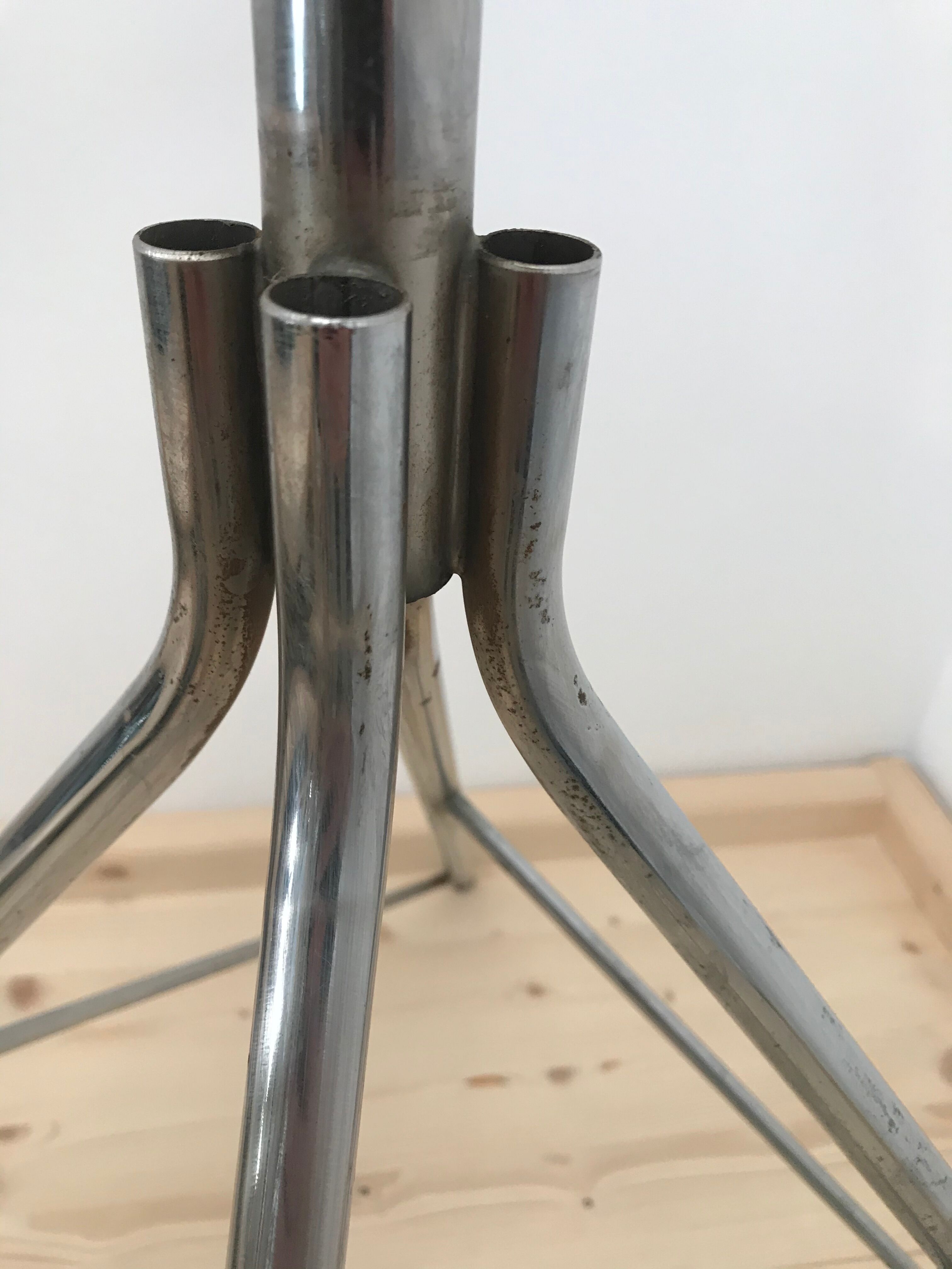 Wearing chrome parrot coat, black and multicolored balls