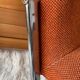 Fauteuil vintage en tweed orangé