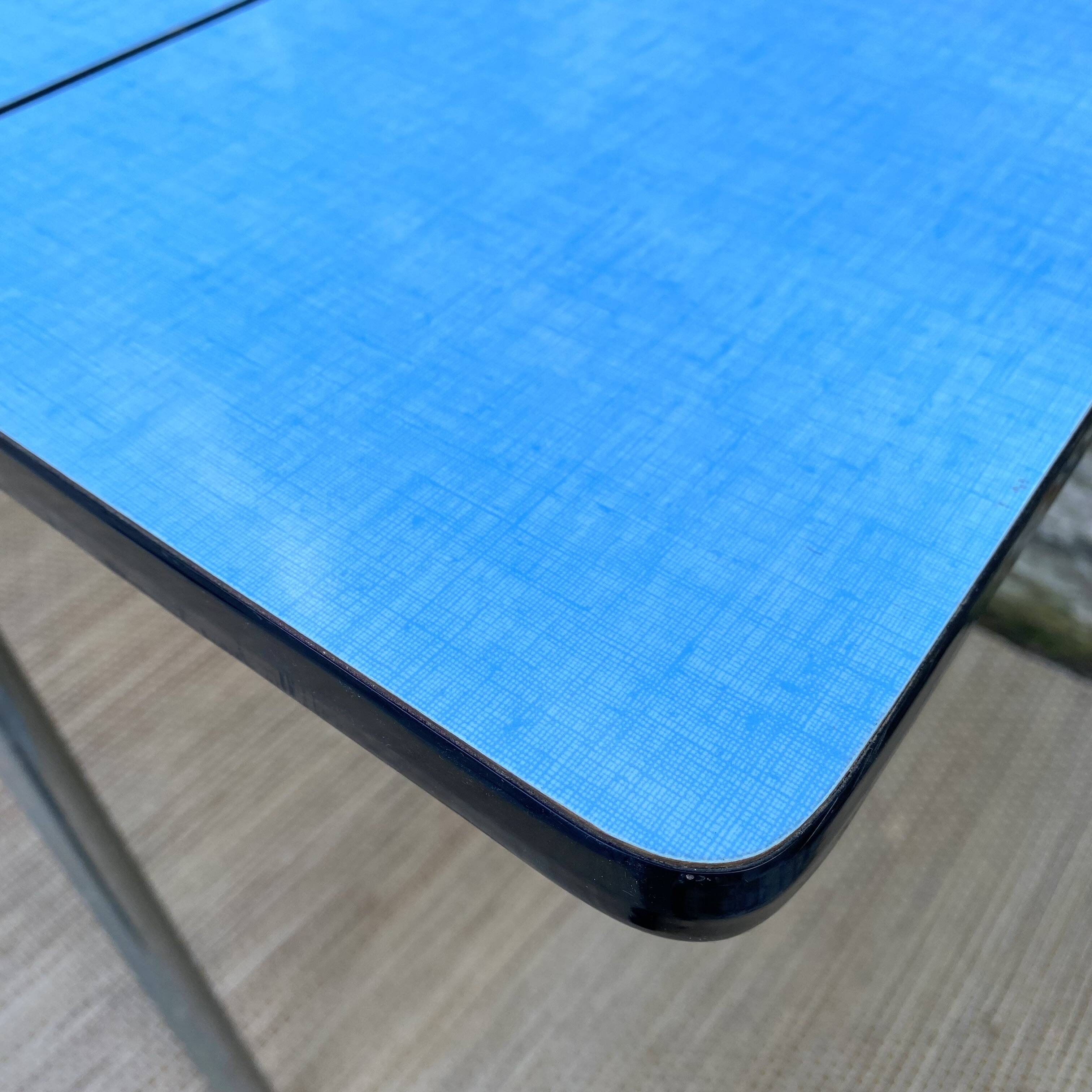 Extendable blue formica table and 2 chairs, 1960s