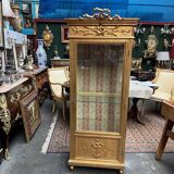 Louis XVI style gilded display case.