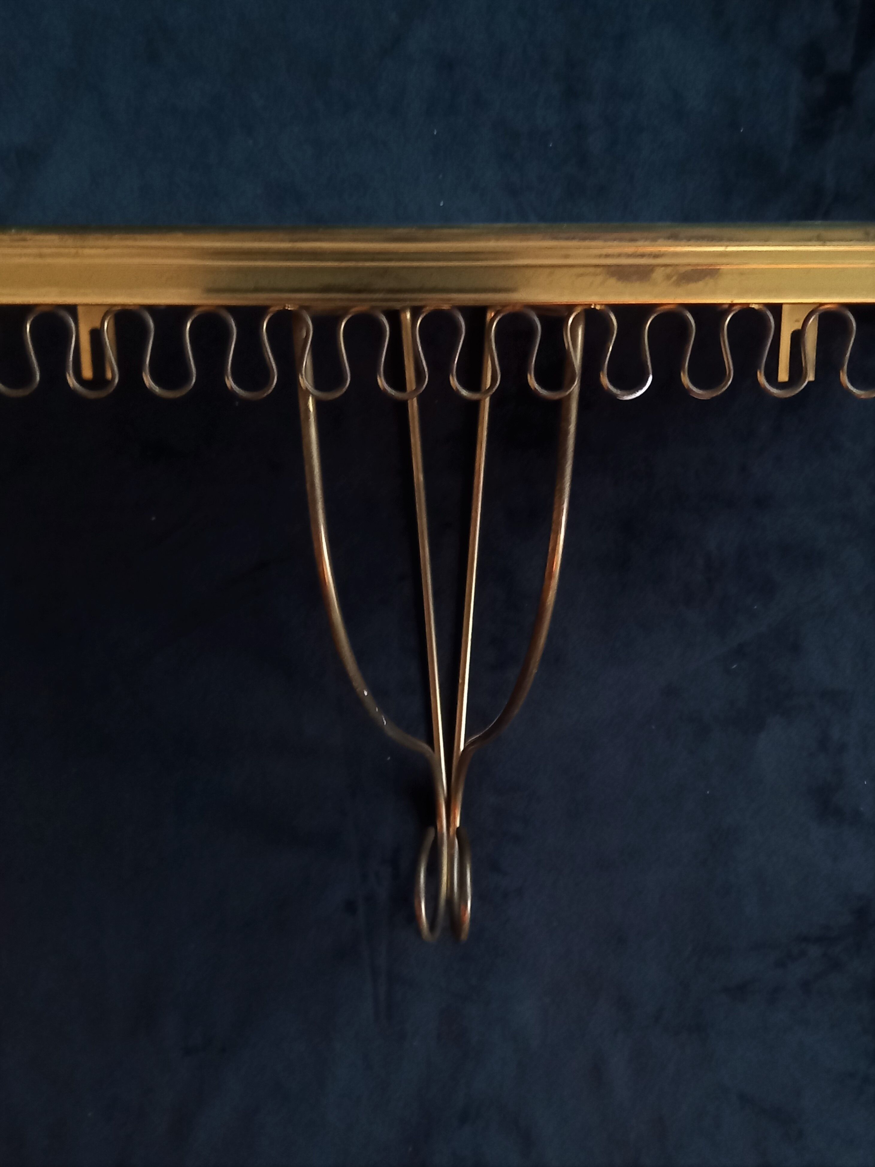 Mirror set and wall lamp in gold metal by deknudt, 1960s