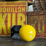 Vintage yellow wooden wall-mounted ball coat hook.