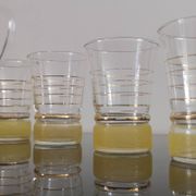 Old pitcher with its 8 yellow granite glasses with gold edging vintage 50's