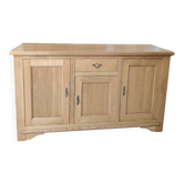 Low sideboard in light solid oak with 3 doors and 1 drawer.