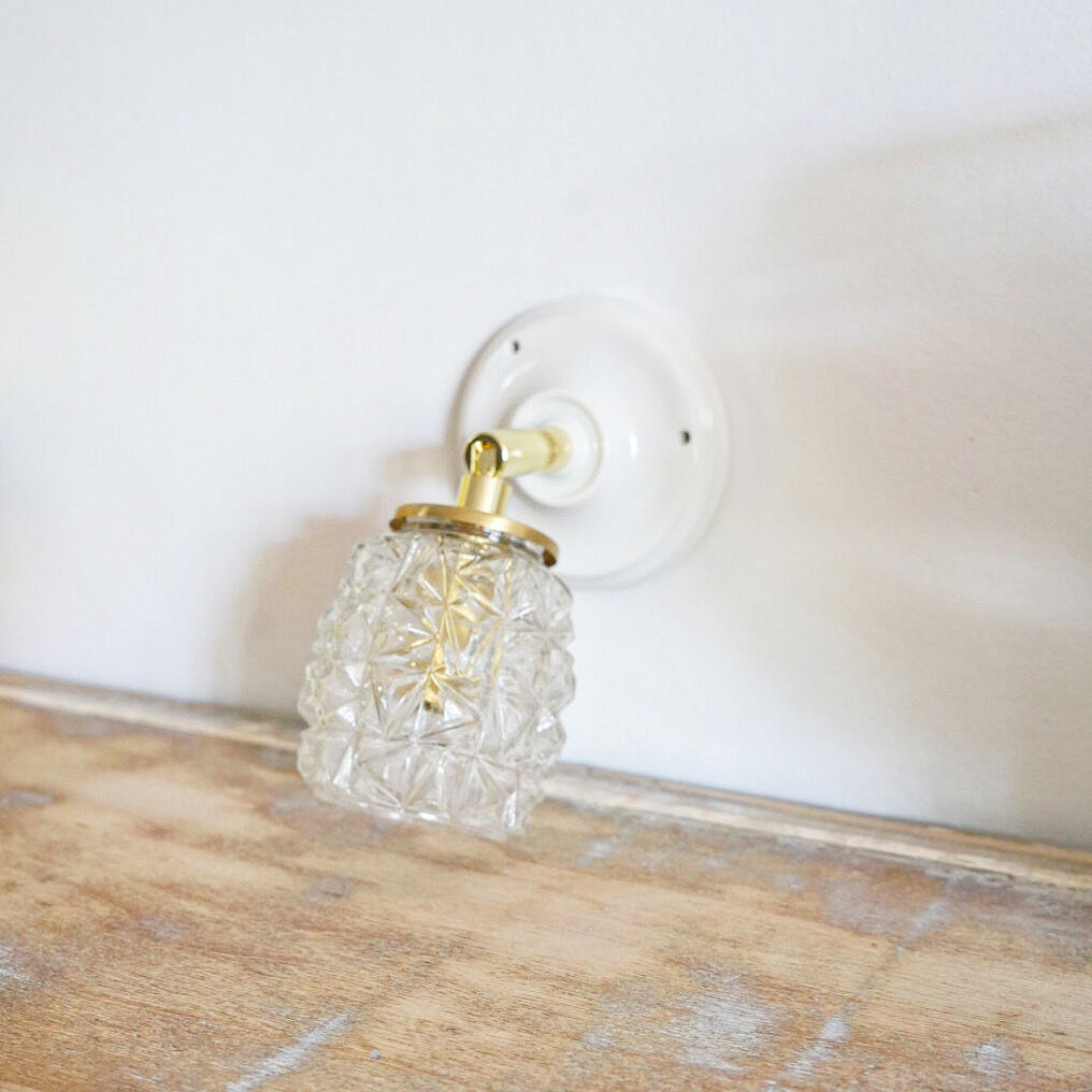 Carved glass wall lamp