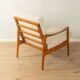 Elegant mid-century armchair from the 1960s with cream-white upholstery