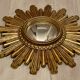 Miroir soleil bombé, golden resin, 1960