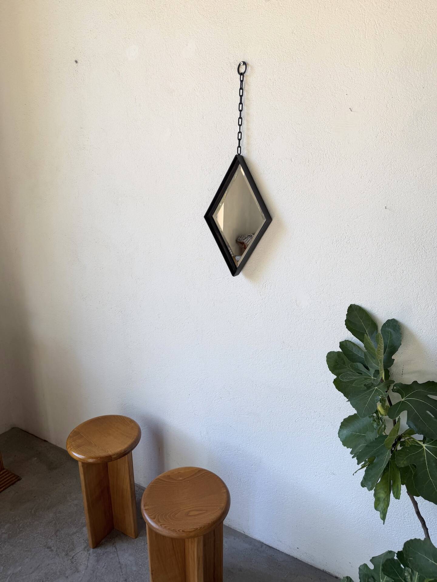 Miroir brutaliste losange en fer