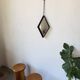 Miroir brutaliste losange en fer